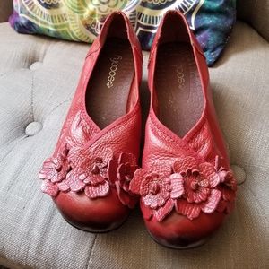 Odd red kitten heels with flower toes